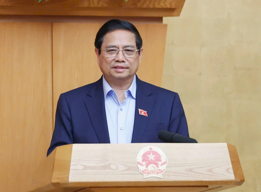Thủ tướng Phạm Minh Chính chủ trì phiên họp của Chính phủ về việc sắp xếp, tổ chức lại đơn vị hành chính các cấp và xây dựng mô hình tổ chức chính quyền địa phương 2 cấp. Ảnh: VIẾT CHUNG 1.jpg