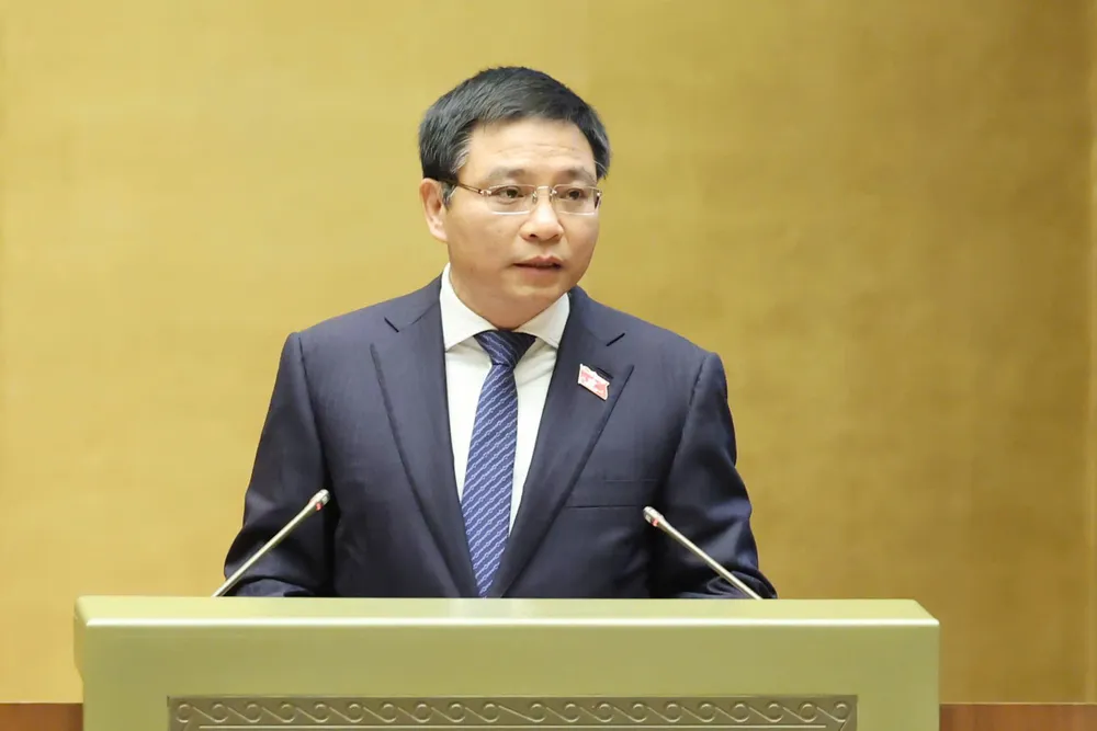 Bộ trưởng Bộ Tài chính Nguyễn Văn Thắng trình bày dự thảo Nghị quyết của Quốc hội về cơ chế, chính sách phát triển kinh tế tư nhân. Ảnh: QUANG PHÚC Bộ trưởng Bộ Tài chính Nguyễn Văn Thắng trình bày tờ trình dự án luật sửa nhiều luật.jpg