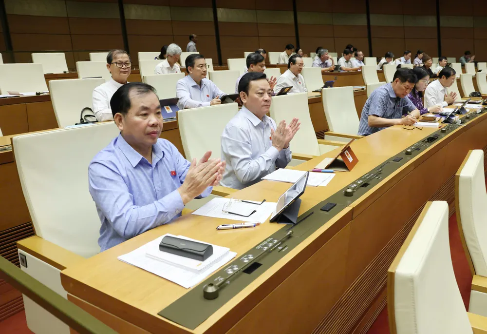 Các đại biểu Quốc hội tán thành thông qua Luật Bảo vệ dữ liệu cá nhân. Ảnh: QUANG PHÚC Các đại biểu Quốc hội tán thành thông qua Luật Bảo vệ dữ liệu cá nhân.jpg