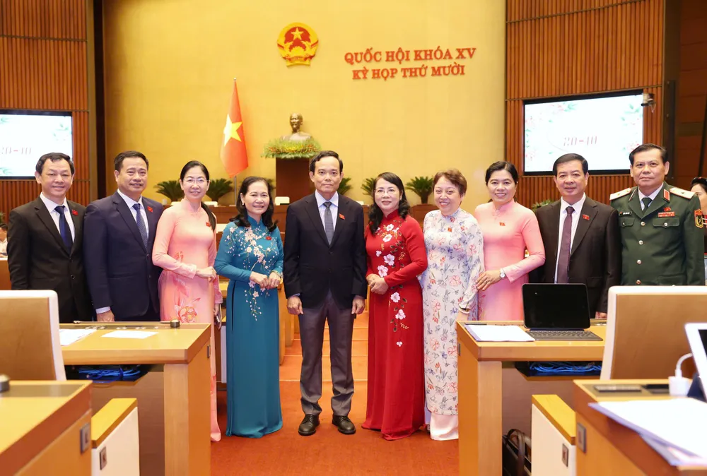 Bí thư Thành ủy TPHCM Trần Lưu Quang và các đại biểu dự phiên họp. Ảnh: QUANG PHÚC 3.jpg