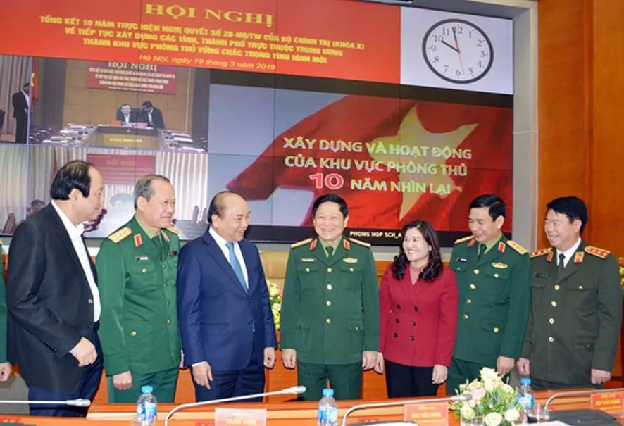 Xây dựng các khu vực phòng thủ ngày càng vững chắc trong tình hình mới ảnh 4