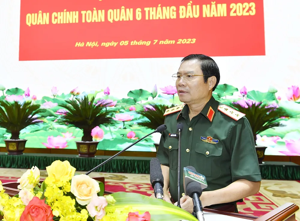 Thượng tướng Nguyễn Tân Cương trình bày báo cáo tại hội nghị. Ảnh: VIẾT CHUNG Thượng tướng Nguyễn Tân Cương trình bày báo cáo tại hội nghị. Ảnh: VIẾT CHUNG