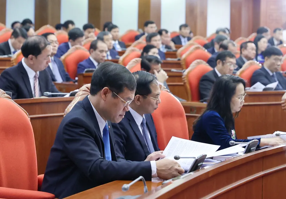 Các đại biểu tham dự hội nghị trong phiên khai mạc. Ảnh VIẾT CHUNG Các đại biểu tham dự hội nghị trong phiên khai mạc. Ảnh VIẾT CHUNG