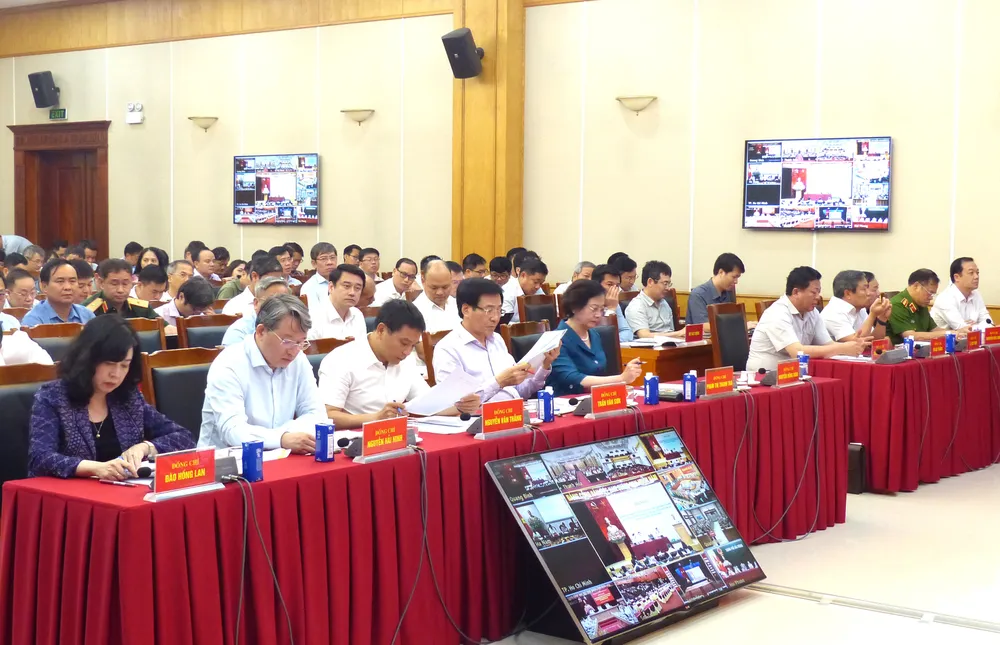 Các đại biểu dự hội nghị tại điểm cầu Văn phòng Trung ương Đảng. Ảnh: TRẦN BÌNH Quang canh hoi nghi 3.JPG