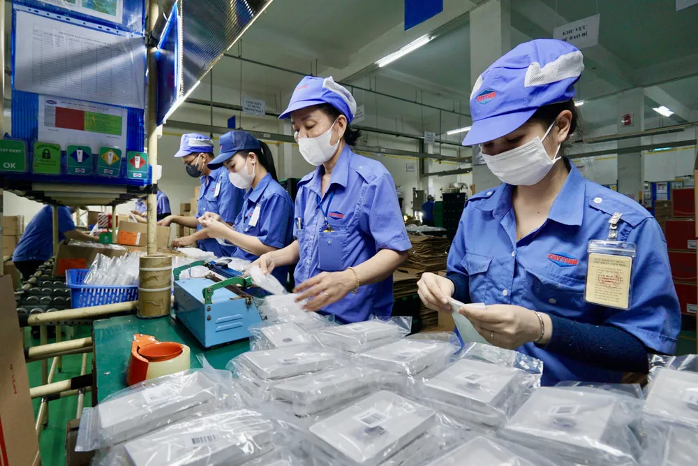 Dây chuyền sản xuất tại Công ty TNHH Sản xuất và thương mại Cát Thái, phường Trường Thạnh, TP Thủ Đức, TPHCM. Ảnh: HOÀNG HÙNG e2b-4825.jpg