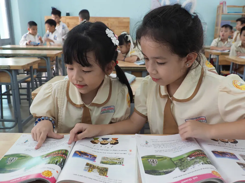 Học sinh Trường Tiểu học Hùng Vương (quận Tân Bình, TPHCM) trong giờ học vào cuối tháng 4-2025 #4a.jpg
