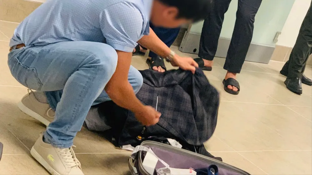 Trung tâm An ninh hàng không Nội Bài đã kiểm tra trực quan người, hành lý xách tay, hành lý ký gửi đối với hành khách N.C.H.