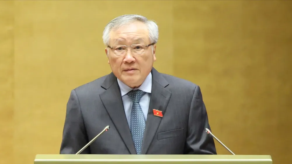 Phó Thủ tướng Thường trực Chính phủ Nguyễn Hòa Bình trình bày báo cáo, sáng 3-12. Ảnh: QUANG PHÚC