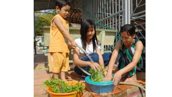 Residents in Can Gio District use tap water (Photo: SGGP)