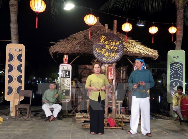 Bai choi is often seen at local spring festivals and resembles a game, using playing cards and village huts. (Source: VNA)