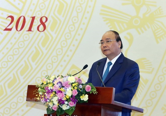 Prime Minister Nguyen Xuan Phuc addresses national teleconference between the Government and localities