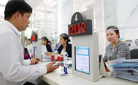 Documents are being digitalized at the People’s Committee of District 1. Photo by Hoang Hung