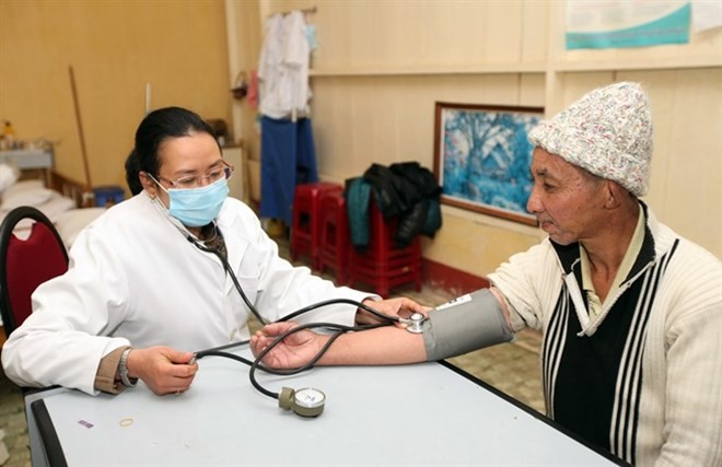 A man with mental illness is cared for at the Social Protection Centre in the Central Highland province of Lam Dong. About 30 percent of Vietnamese population or 28.2 million are suffering from mental health issues, with 25 percent experiencing depression