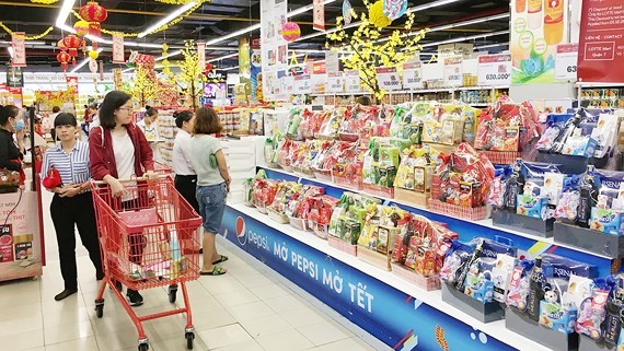 Domestic market of gift baskets for Tet Holiday bustling