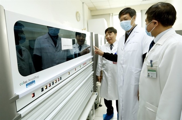 Experts from the Ministry of Health check disease prevention and control at the National Hospital for Tropical Diseases. — Photo VNA/VNS