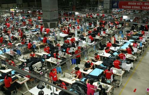 Firms find it significant to improve labour productivity to enhance competitiveness in Industry 4.0 (Photo: VNA)