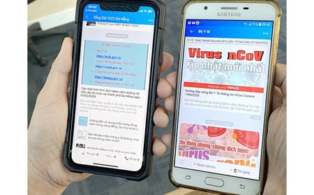 Information about nCoV appears on mobile apps. (Photo: SGGP)