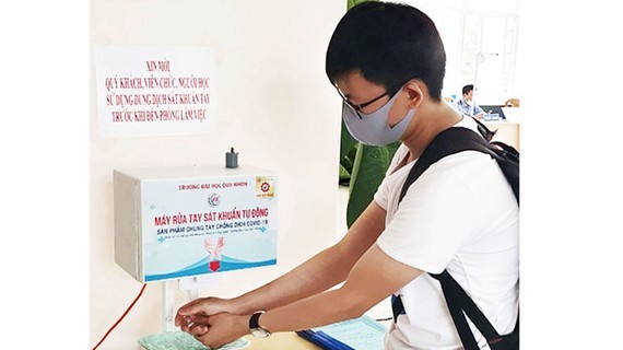 Touch-free automatic hand sanitizer dispenser invented for community sake