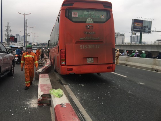 Passenger bus climbs on median strip causing traffic chaos