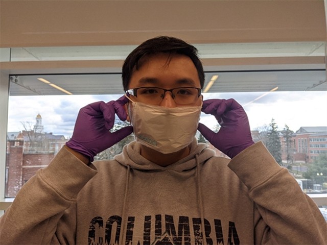 A member of the research team wears the prototype of disposable face masks invented from autolytic piezoelectric polymer sheet. — Photo vietnamnet.vn