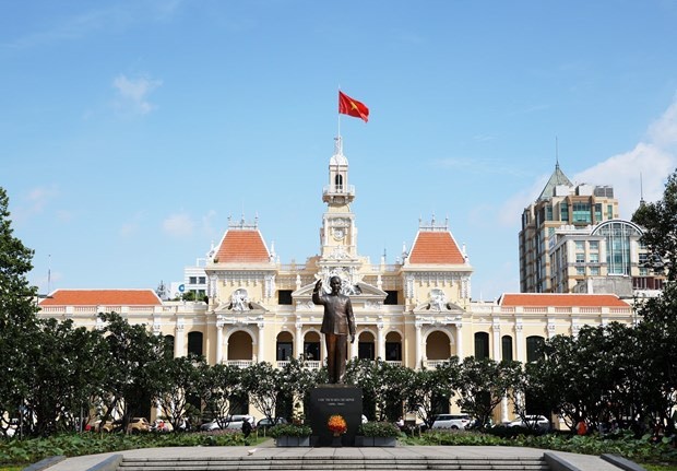 With stunning architecture, the Ho Chi Minh City People’s Committee building impresses tourists with its sophisticated reliefs carved on walls and its Roman columns and arches. (Photo: VNA) With stunning architecture, the Ho Chi Minh City People’s Committee building impresses tourists with its sophisticated reliefs carved on walls and its Roman columns and arches. (Photo: VNA)