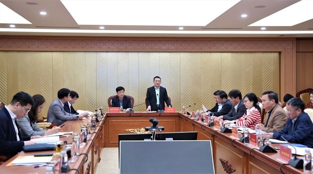 Minister of Finance Ho Duc Phoc (center) speaks at the event. (Photo: VNA)