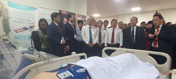 Participants tour the new building Participants tour the new building