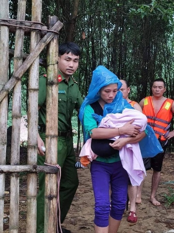 Police officers evacuate people from flood hit area Police officers evacuate people from flood hit area