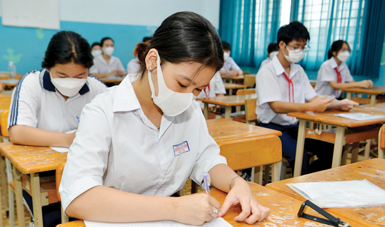 Candidates take the 10th-grade entrance exam at Suong Nguyet Anh Secondary School, Ho Chi Minh City. Photo by CAO THANG