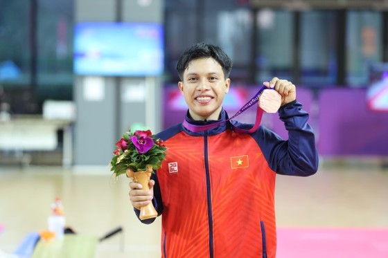 Taekwondo fighter Tran Ho Duy brings home the second medal for the Vietnamese delegation at Asiad 19