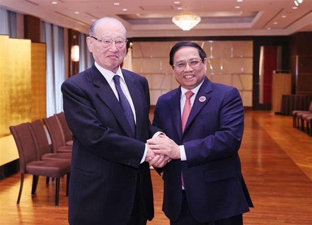 PM Pham Minh Chinh (R) receives President of the International Friendship Exchange Council (FEC) of Japan Ken Matsuzawa. (Photo: VNA) chinh-1672.jpg