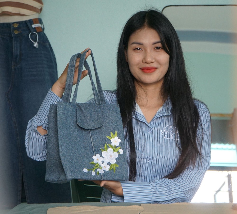 The young girl upcycles old clothes into pretty items recyle-4-1641.jpg
