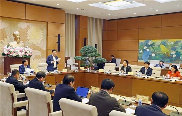 NA Chairman Vuong Dinh Hue speaks at the working session. (Photo: VNA) na-hue-1693.jpg
