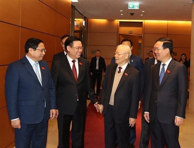 Party General Secretary Nguyen Phu Trong (second, right), State President Vo Van Thuong (first, right), Prime Minister Pham Minh Chinh (first, left), and NA Chairman Vuong Dinh Hue attend the 15th NA's fifth extraordinary session. (Photo: VNA) party-general-secretary-trong-at-na-extraordinary-session-8791.jpg