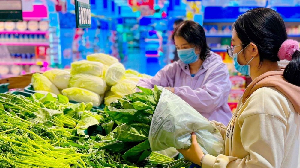 People buy vegetables at a supermarket supermarket-5100.jpg