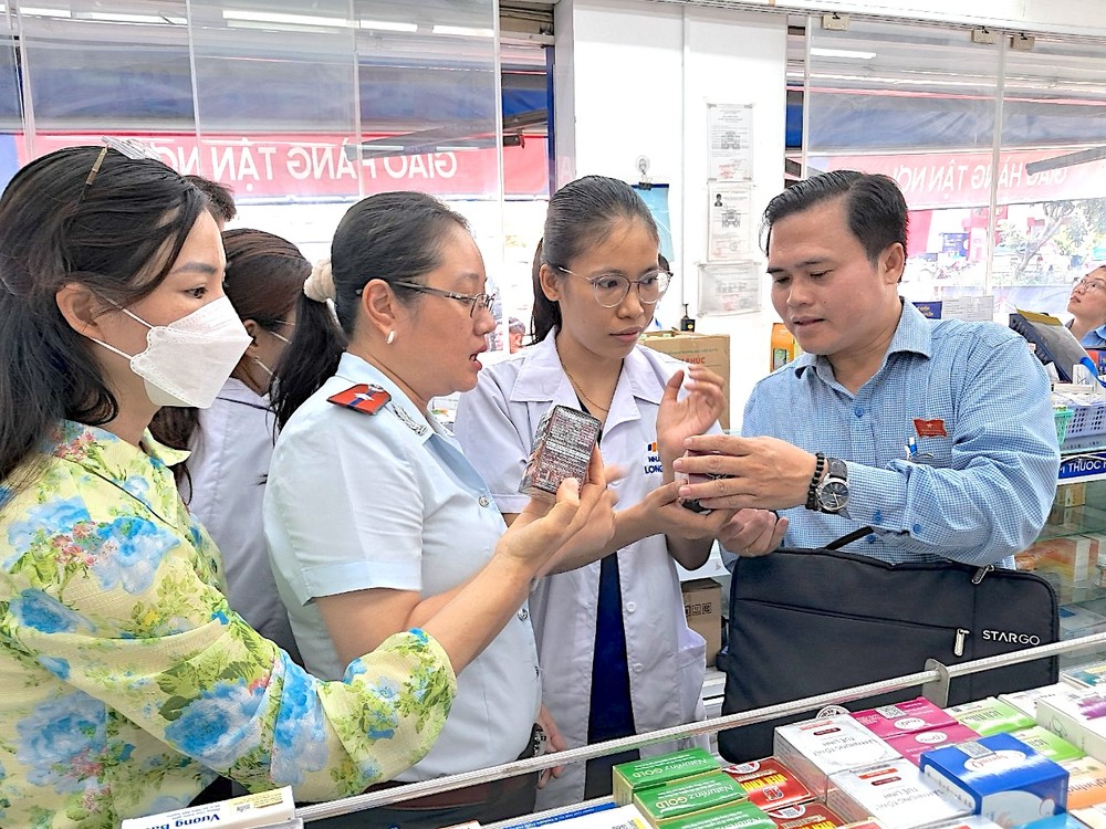 Inspectors pay a visit at a pharmacy drug.jpg