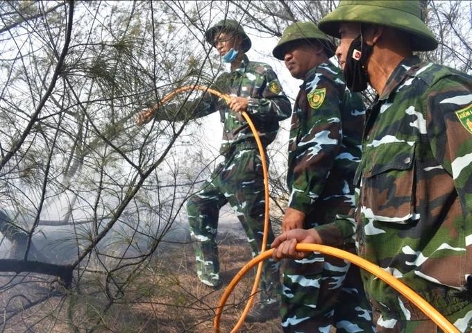 Forest rangers in Quang Binh Province practice forest fire prevention and fighting. forest.jpg
