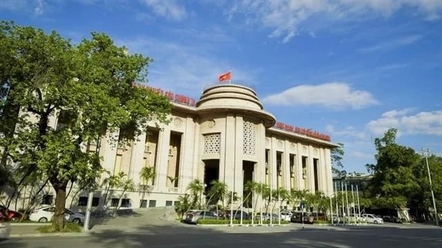 The State Bank of Vietnam's headquarters in Hanoi. The central bank has issued new regulations on opening indirect investment accounts. (Photo nhandan.vn) VNA.jpg