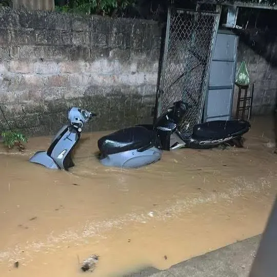 A motorcycle in Lang Son Province is submerged in the rainwater. img-9083-1983-1999.jpeg