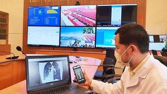 Telehealth platforms in use at Hanoi Medical University Hospital. (Photo: nhandan.vn) 433290-5202492446243436-23062001vthuy30.jpg