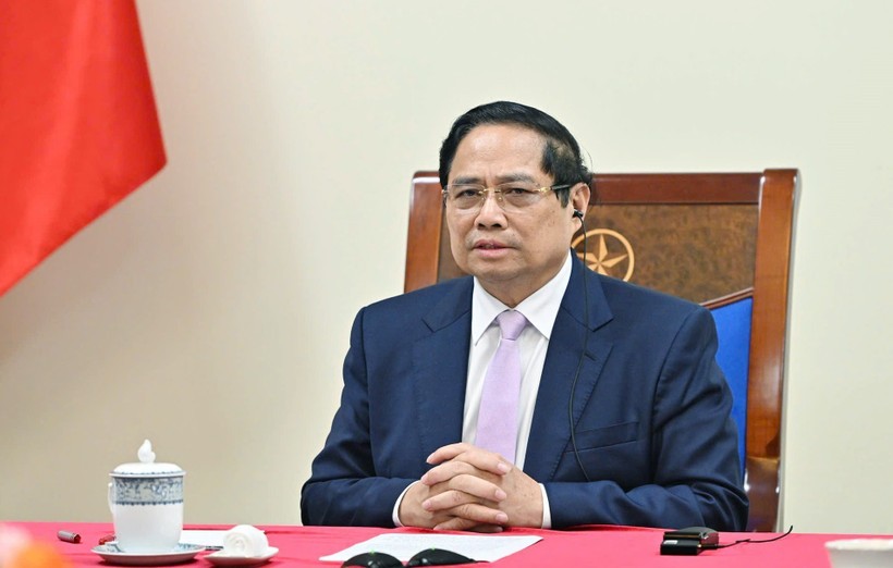 Vietnamese Prime Minister Pham Minh Chinh holds phone talks with his Malaysian counterpart Anwar Ibrahim on July 30. (Photo: VNA) vna-potal-thu-tuong-pham-minh-chinh-dien-dam-voi-thu-tuong-malaysia-anwar-ibrahim-8181281.jpg