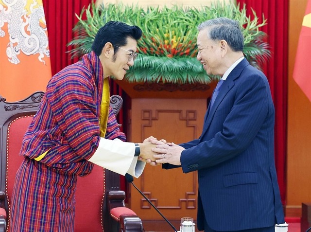 Party General Secretary To Lam (R) receives King of Bhutan Jigme Khesar Namgyel Wangchuck in Hanoi on August 19. (Photo: VNA) lam.jpg
