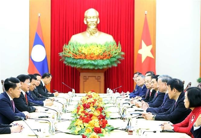 Party General Secretary To Lam has a meeting with Party General Secretary and President of Laos Thongloun Sisoulith in Hanoi on September 2. (Photo: VNA) meeting.jpg