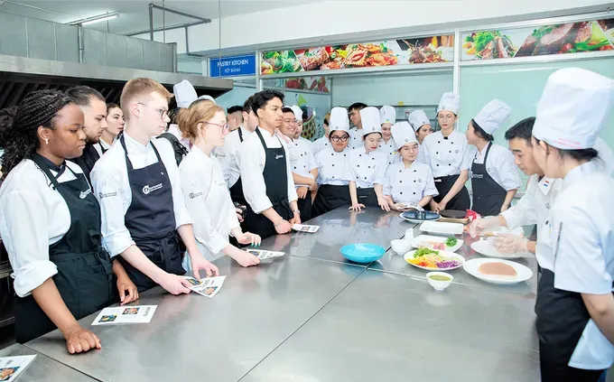 Students of the international joint program of Ho Chi Minh City University of Technology during a practical class. edu.jpg