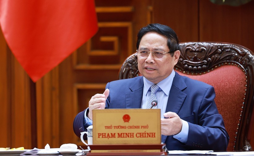 PM Pham Minh Chinh speaks at the meeting (Photo: VNA) hh.jpg