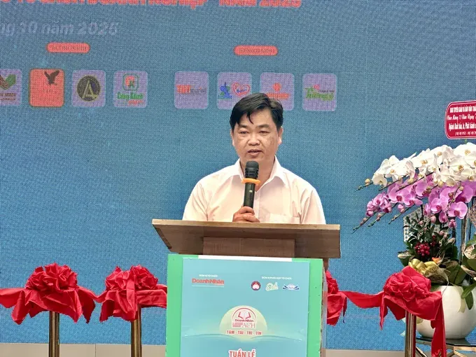 Deputy Head Le Van Minh of the Propaganda and Mass Mobilization Commission of the Ho Chi Minh City Party Committee speaks at the event minh.jpg