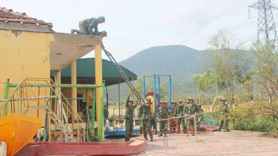 Funtional forces help local people to repair their houses after typhoon Doksuri