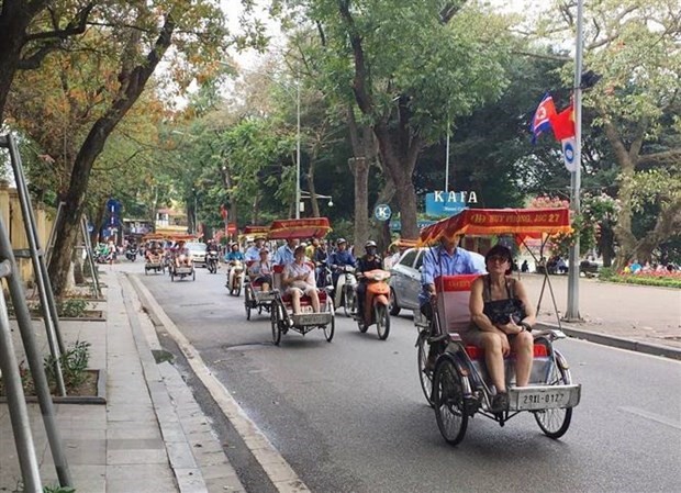 Foreign visitors in Vietnam (Photo: VNA)