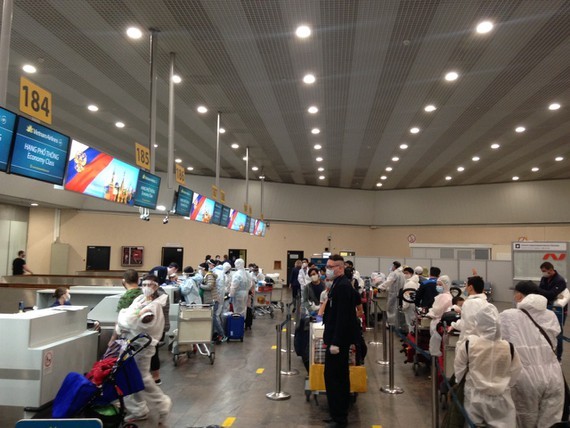 Passengers check in at the airport of Moscow