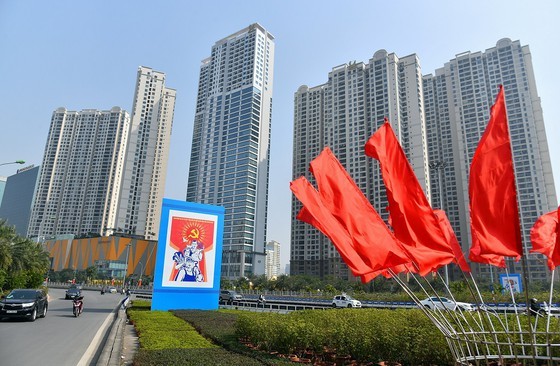 Hanoi streets covered with flags and posters to welcome the 13th National Party Congress 